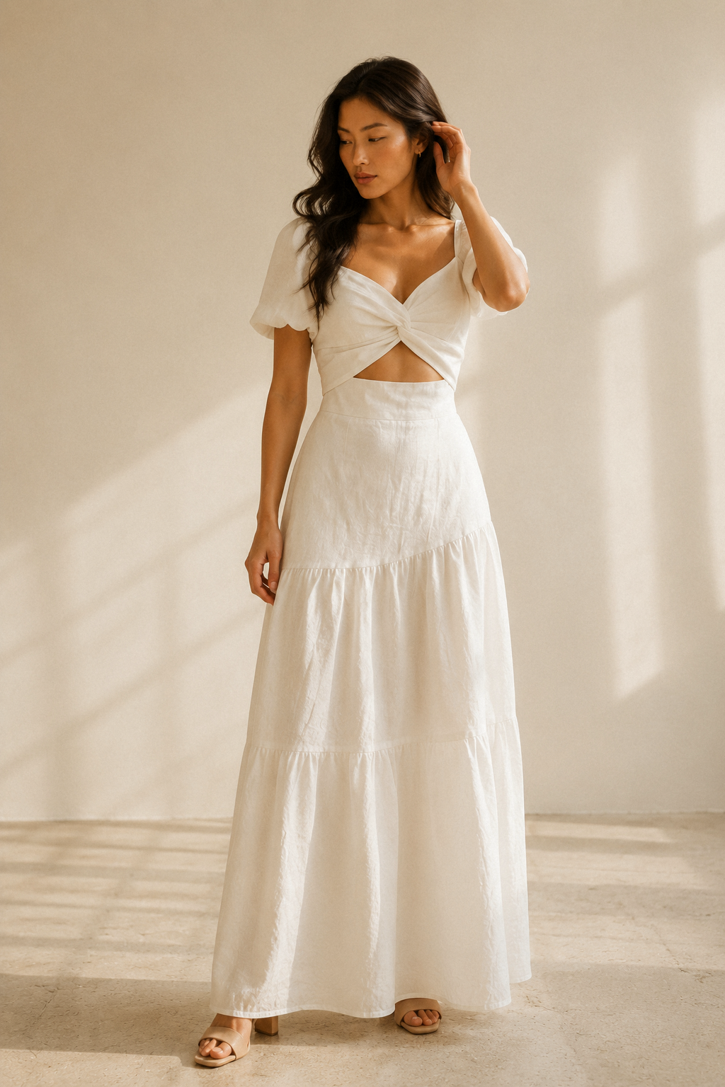 Ivory linen fit-and-flare midi dress, full front view, waist cut-out and flowing skirt
