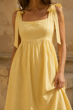 Butter yellow linen a-line midi dress, fabric detail, flax weave in raking light