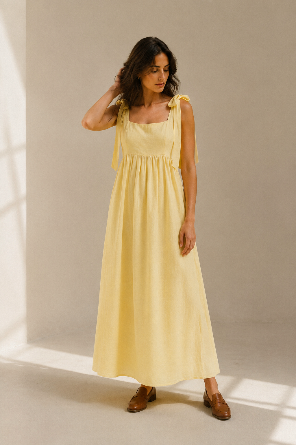 Butter yellow linen a-line midi dress, full front view, a-line skirt and gathered waist