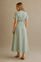 Sage green linen wrap midi dress, back view, relaxed fit, subtle drape