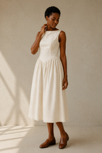 Ivory linen a-line midi dress, three-quarter view, natural waist and flowing skirt