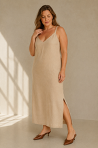 Beige linen slip midi dress, full front view, clean front and flowing drape