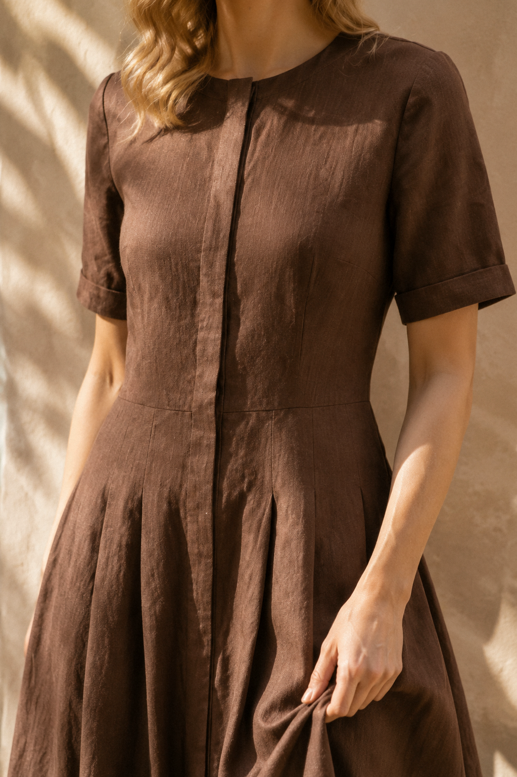 Brown linen a-line midi dress, fabric detail, flax weave in raking light