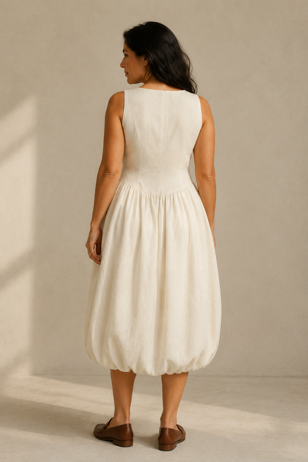 Ivory linen a-line midi dress, back view, smooth bodice, gentle skirt release