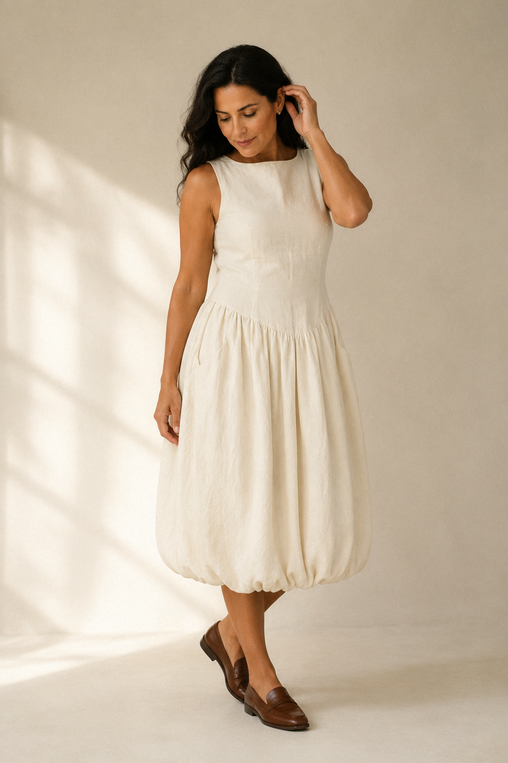 Ivory linen a-line midi dress, three-quarter view, fluid skirt, relaxed fit, natural drape