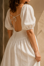 Ivory linen a-line midi dress, fabric detail, flax weave in raking light