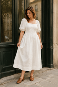 Ivory linen a-line midi dress, front view, scoop neckline and puff sleeves