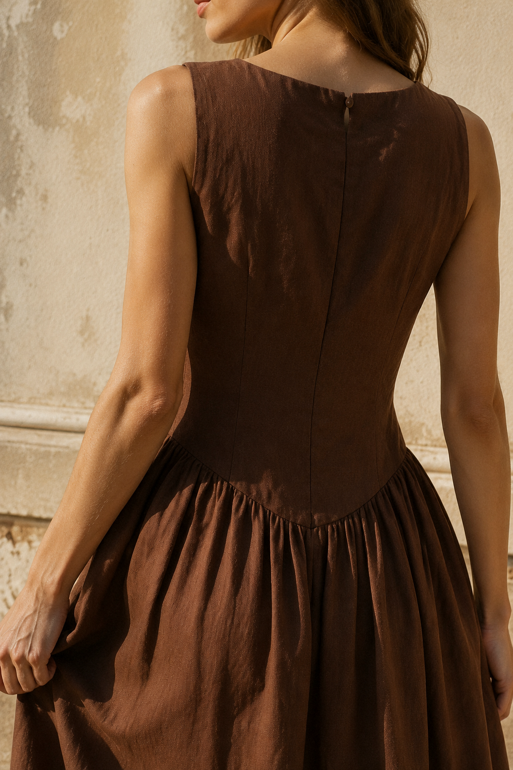 Brown linen bubble midi dress, fabric detail, flax weave in raking light