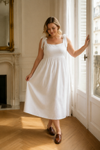 White linen a-line midi dress, front view, square neckline with tie shoulder straps