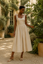 Light beige linen a-line midi dress, front view, sweetheart neckline, tie shoulder straps
