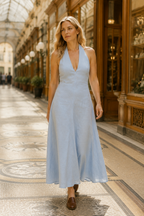 Light blue linen a-line midi dress, lifestyle, afternoon light, a relaxed silhouette