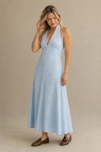 Light blue linen a-line midi dress, three-quarter view, flowing A-line skirt