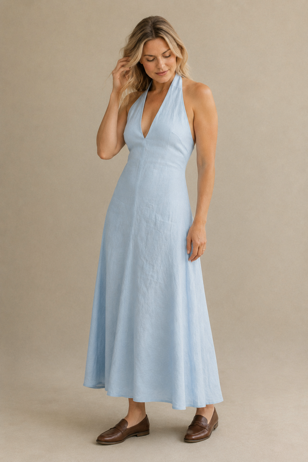 Light blue linen a-line midi dress, three-quarter view, flowing A-line skirt