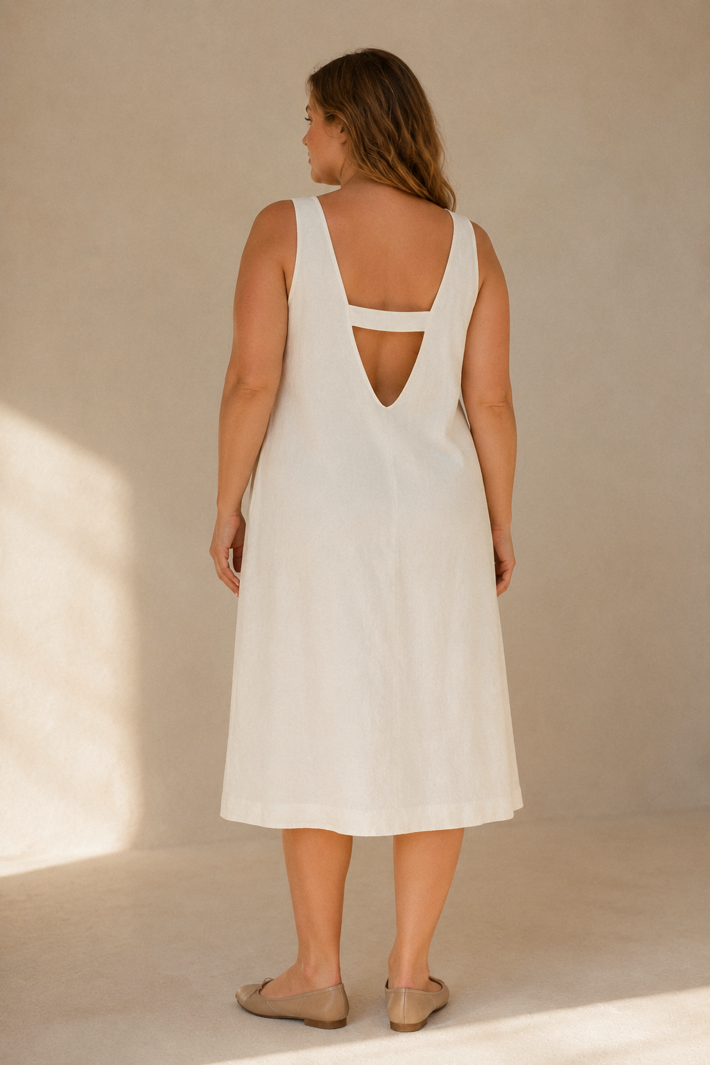 Ivory linen shift midi dress, back view, deep V-back and strap detail