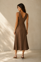 Brown linen a-line midi dress, back view, fitted bodice and flowing A-line skirt