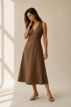 Brown linen a-line midi dress, three-quarter view, a-line silhouette with graceful fabric drape