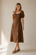 Brown linen a-line midi dress, full front view, puff sleeves and flowing skirt