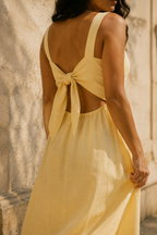 Butter yellow linen a-line midi dress, fabric detail, flax weave in raking light
