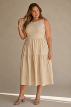 Beige linen tiered midi dress, full front view, full tiered skirt and scoop neck