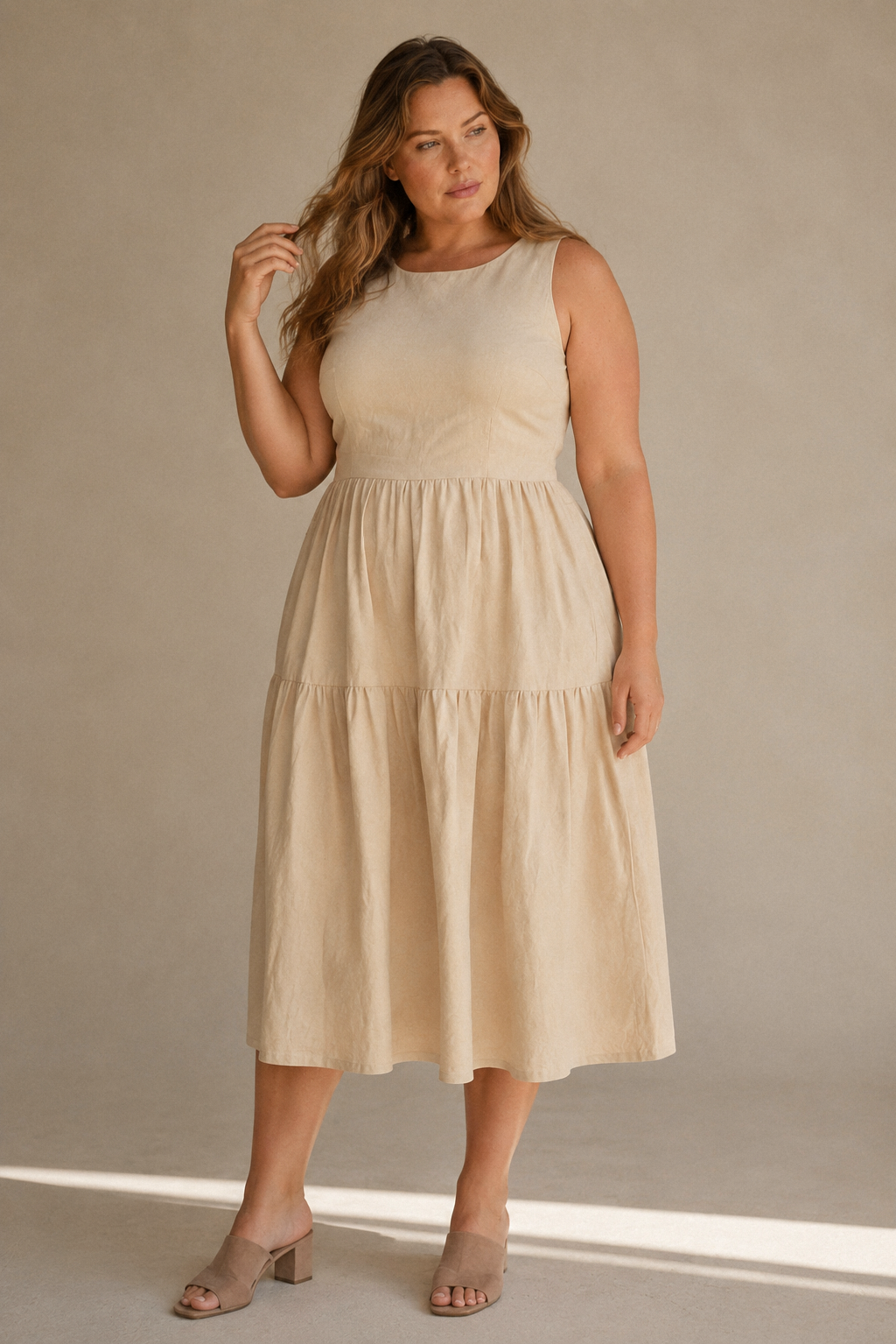 Beige linen tiered midi dress, full front view, full tiered skirt and scoop neck