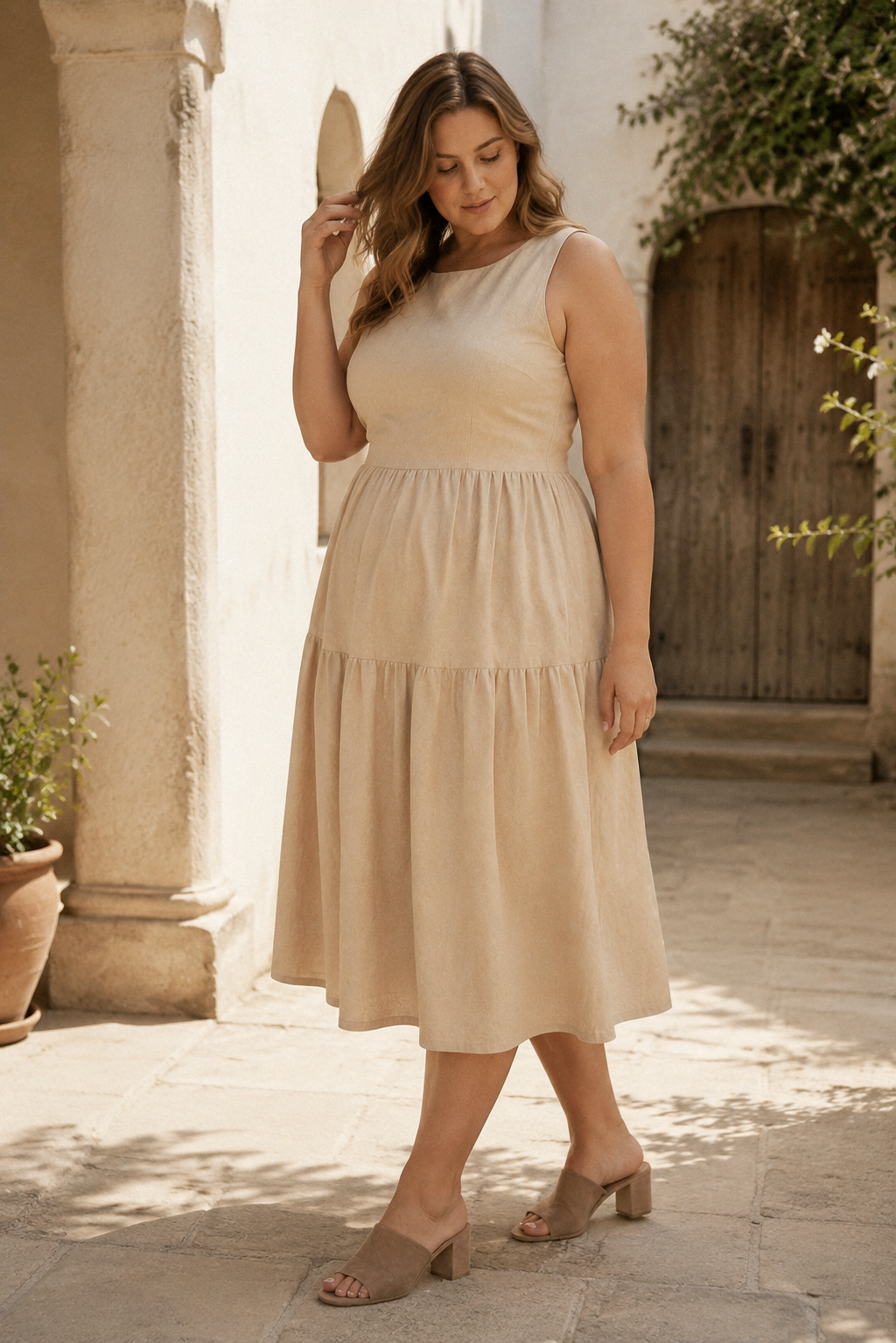 Beige linen tiered midi dress, three-quarter view, tiered skirt and back tie detail