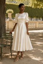 Ivory silk a-line midi dress, lifestyle, soft light and gentle movement