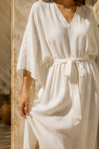 Ivory linen a-line midi dress, fabric detail, flax weave in raking light