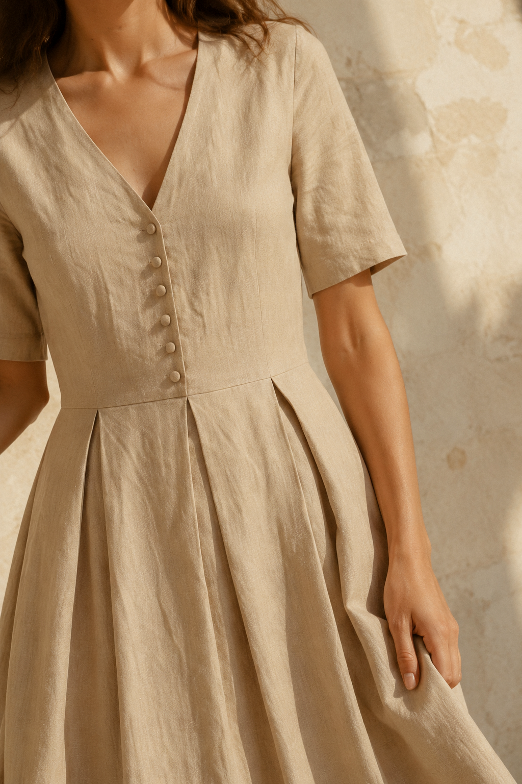 Beige linen a-line midi dress, fabric detail, flax weave in raking light