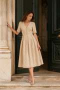 Beige linen a-line midi dress, front view, V neckline and button front