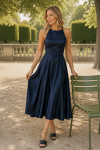 Navy blue silk a-line midi dress, lifestyle, evening event, soft light