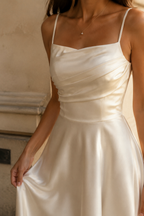 Ivory silk a-line midi dress, fabric detail, soft sheen in raking light