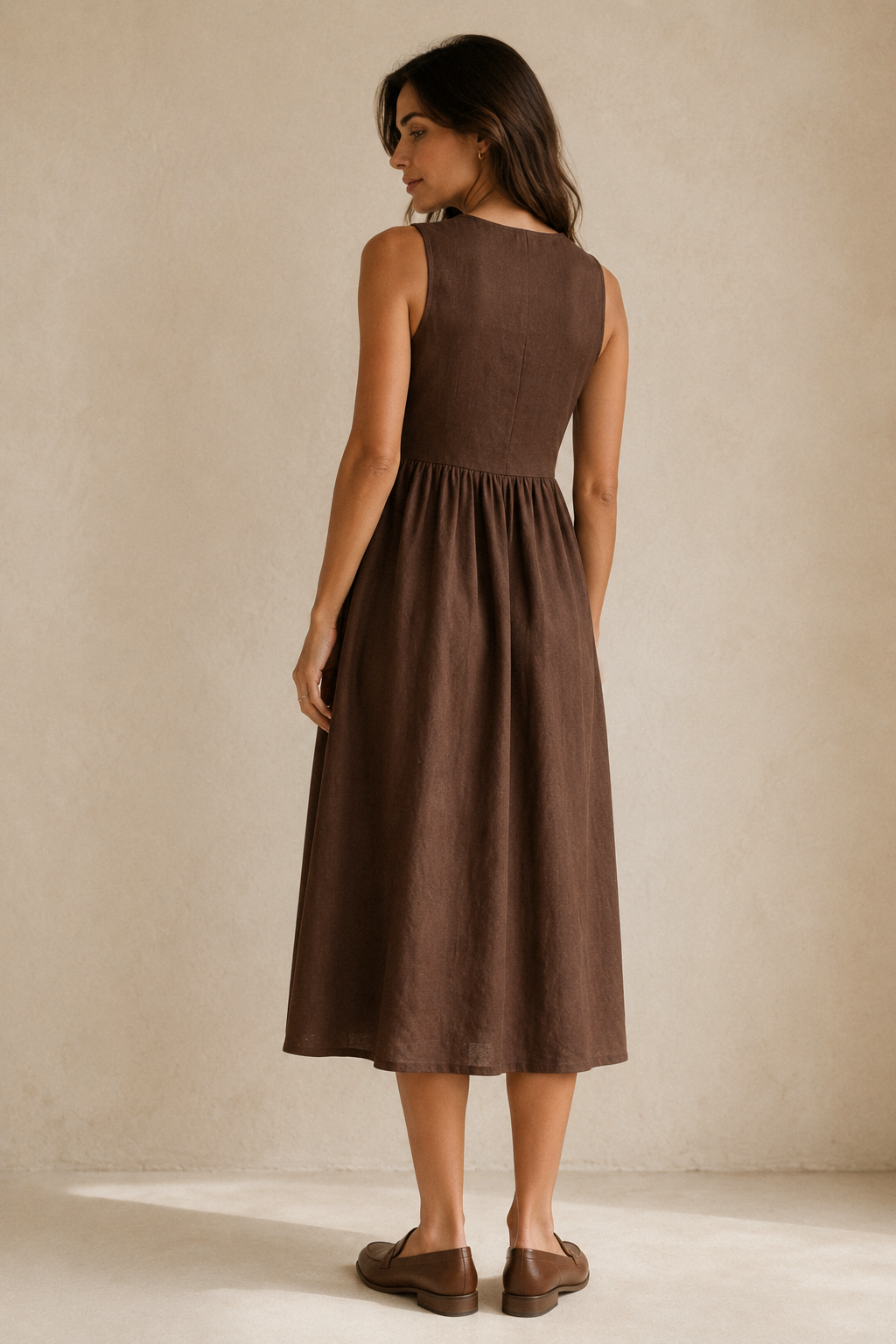 Chocolate brown linen a-line midi dress, back view, sleeveless design, smooth back bodice