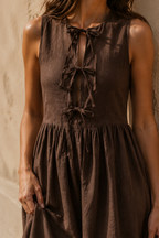 Chocolate brown linen a-line midi dress, fabric detail, flax weave in raking light