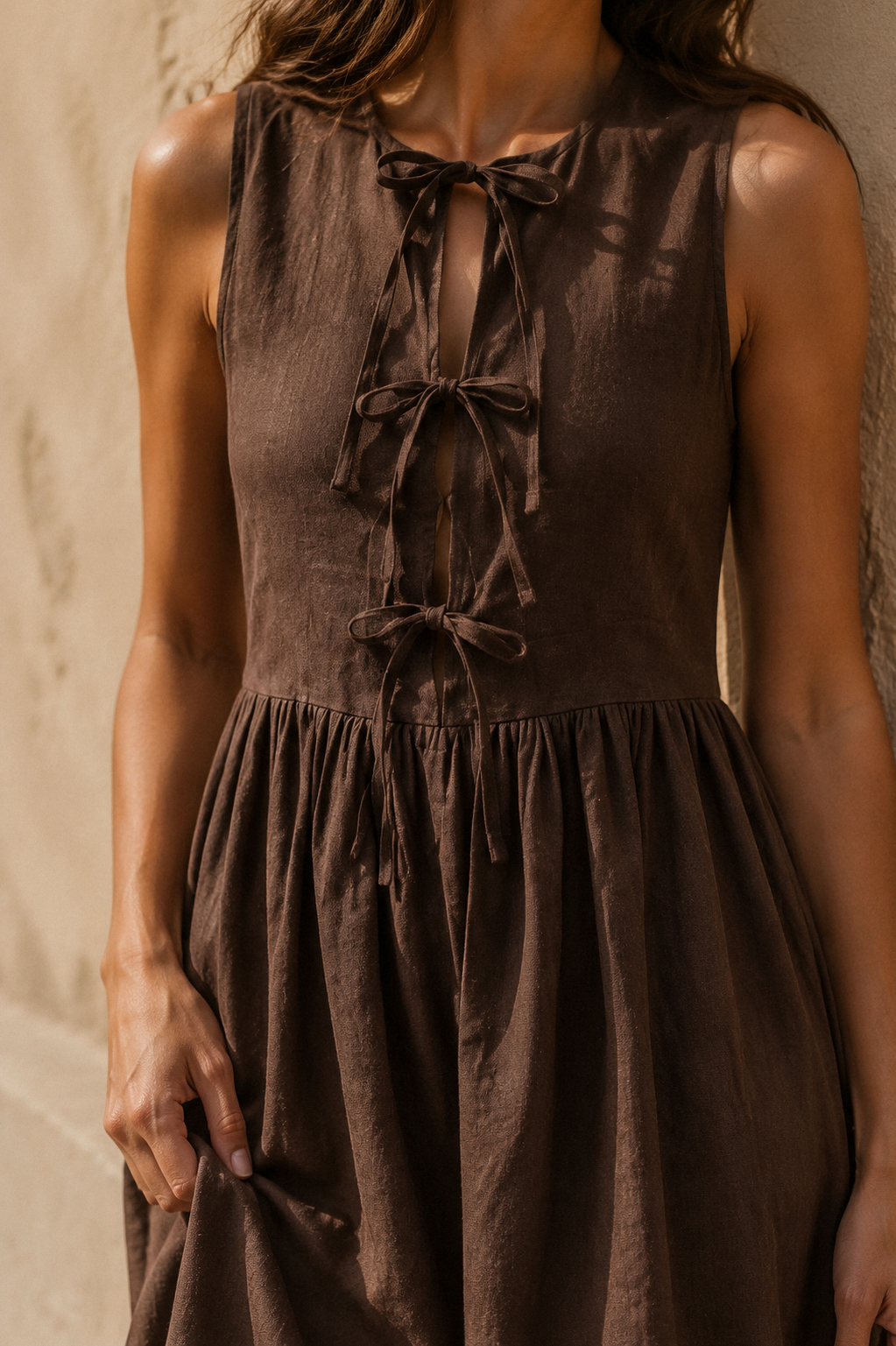 Chocolate brown linen a-line midi dress, fabric detail, flax weave in raking light