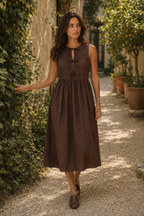 Chocolate brown linen a-line midi dress, lifestyle, afternoon stroll in understated style