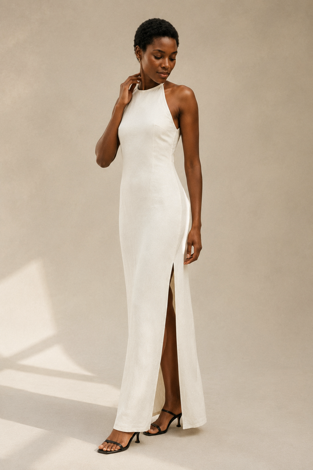 Ivory linen column midi dress, three-quarter view, relaxed fit and natural fabric drape