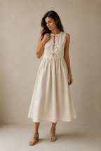 Ivory linen a-line midi dress, full front view, a-line silhouette, flowing midi skirt