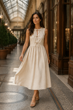 Ivory linen a-line midi dress, lifestyle, sunny afternoon, gentle breeze