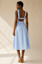 Light blue cotton a-line midi dress, back view, low open back with ruched straps