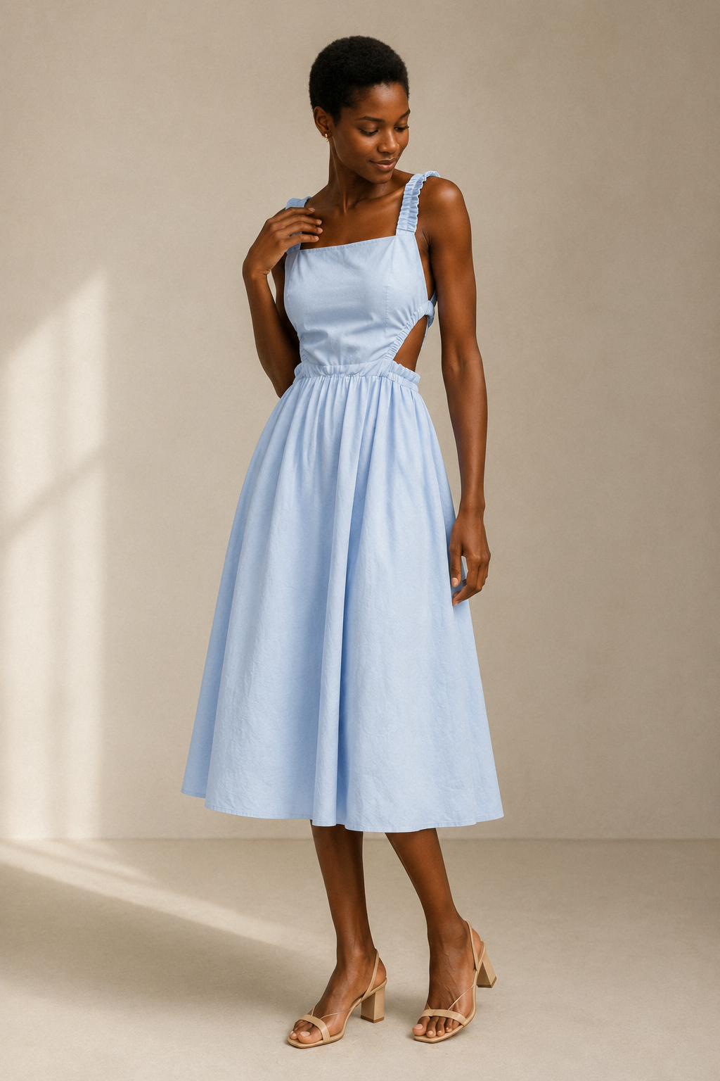 Light blue cotton a-line midi dress, full front view, straight neckline and full skirt